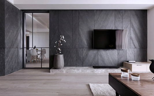 graphite stria black wall veneer on a tv wall