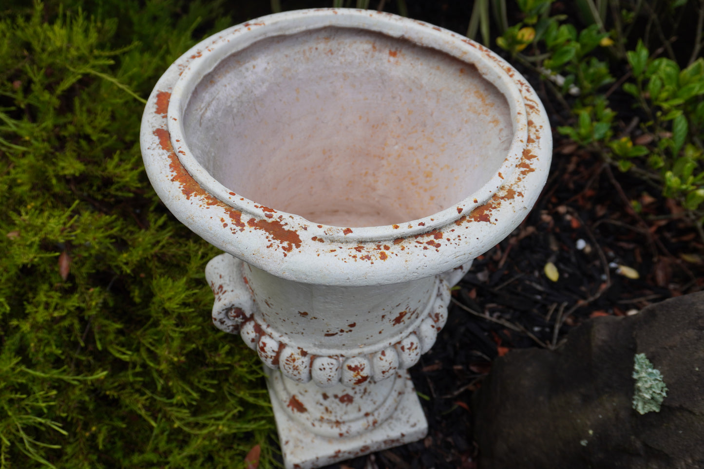 top view of Medici Urn with rust details