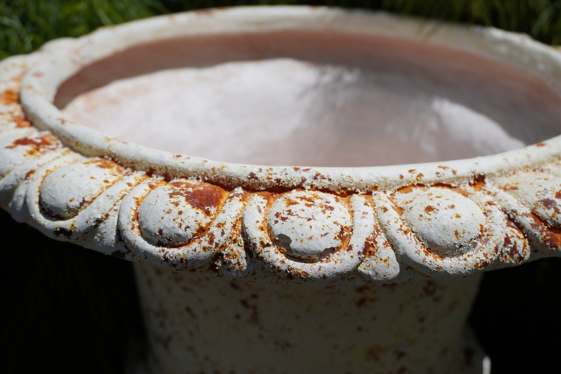 zoomed in Medici Urn showcasing rust